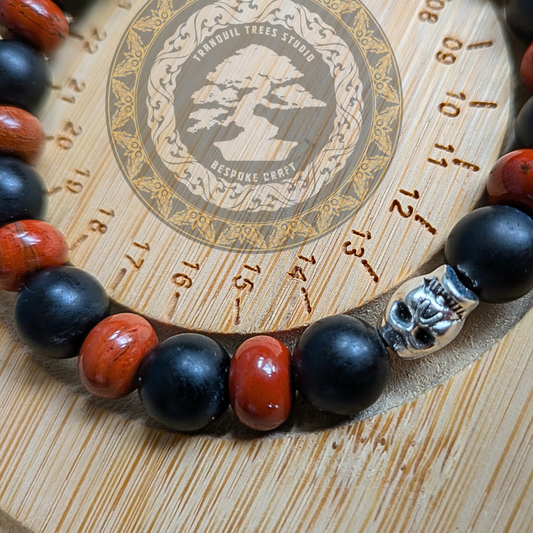 “Root fire” – Red Jasper, Frosted Black Onyx Bracelet with Skull Accent | Grounding Handmade Bracelet